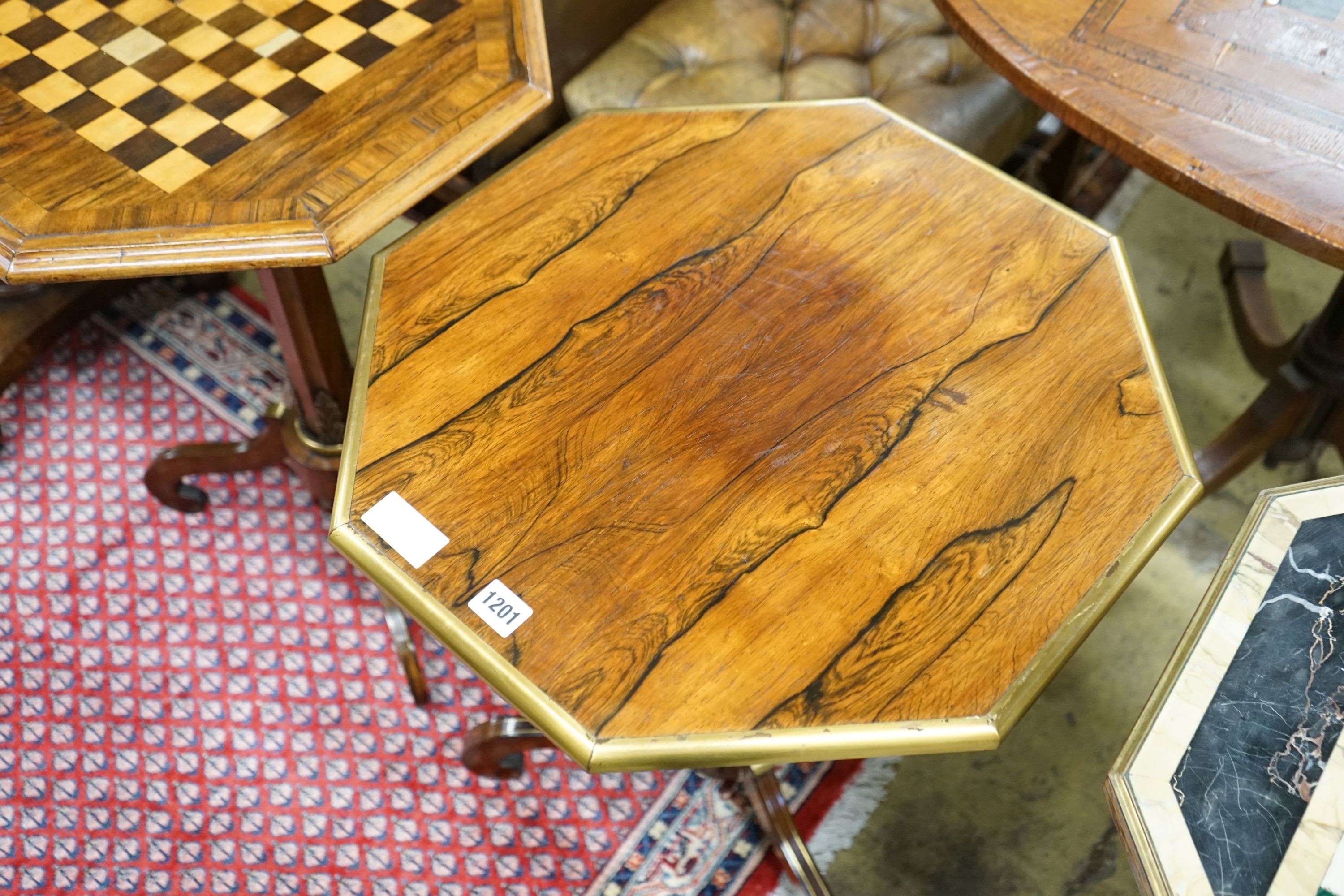 A Regency style brass mounted octagonal rosewood tripod occasional table, width 51cm, height 70cm